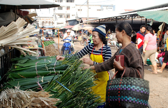 [Photo] Vientiane sôi động đón tết cổ truyền của người Việt ảnh 4