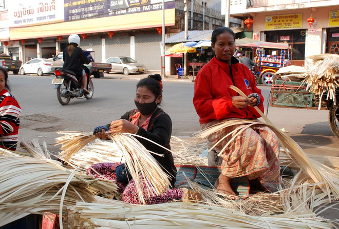 [Photo] Vientiane sôi động đón tết cổ truyền của người Việt ảnh 7