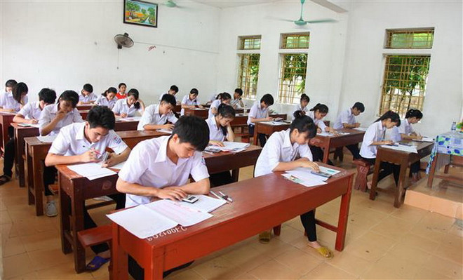 Thí sinh thi tại điểm thi THPT Nho Quan C, huyện Nho Quan, tỉnh Ninh Bình năm 2018. (Ảnh: Hải Yến/TTXVN) Dự kiến điều chỉnh 6 điểm trong Quy chế tuyển sinh đại học 2019 ảnh 1