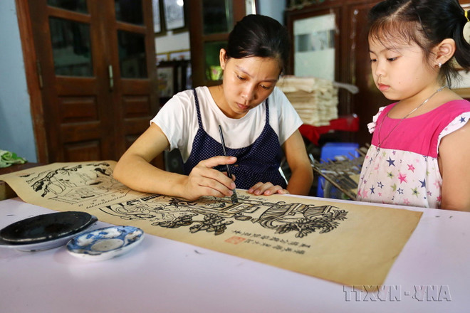 [Photo] Ngày quốc tế phụ nữ 8/3: Những bông hoa “giữ lửa” nghề ảnh 7