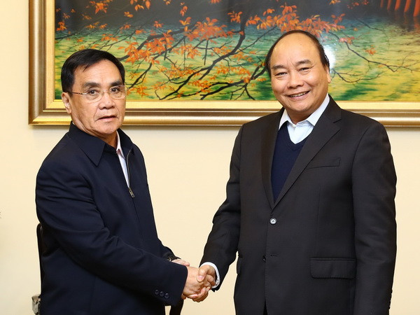 Việt Nam luôn hỗ trợ Lào nhiệt tình, trong sáng và vô tư nhất ảnh 1