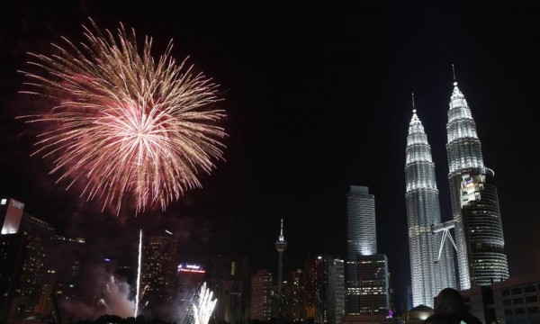 Tháp đôi Petronas. (Nguồn: Reuters) Sự cố MH370 không ảnh hưởng nhiều đến du lịch Malaysia ảnh 1