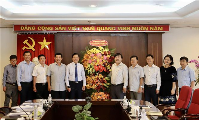 Cơ quan TTXVN khu vực phía Nam đẩy mạnh hợp tác thông tin với Long An ảnh 1