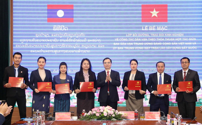 Việt-Lào trao đổi kinh nghiệm công tác vận động quần chúng ảnh 1