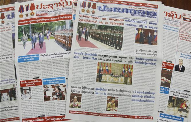 Báo chí Lào tiếp tục đưa tin đậm nét về chuyến thăm của Chủ tịch nước ảnh 1