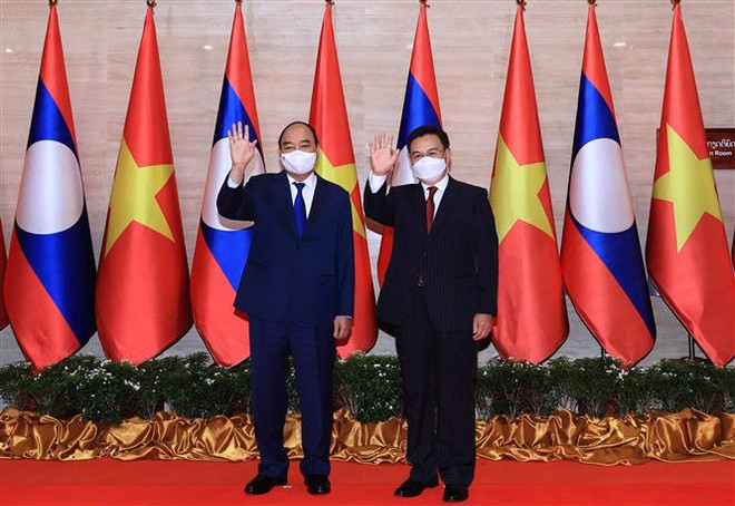 Chủ tịch nước Nguyễn Xuân Phúc dự Lễ trao tặng Nhà Quốc hội Lào ảnh 1