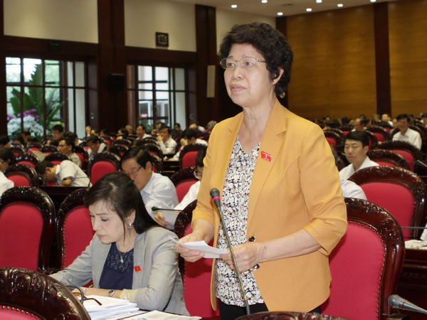 Quốc hội nhất trí cao thông qua Luật nhập, xuất cảnh ảnh 1