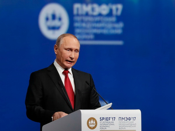 Tổng thống Nga Vladimir Putin. (Ảnh: EPA/TTXVN) Tổng thống Putin: Nga sẽ đáp trả những nỗ lực bao vây của Mỹ ảnh 1
