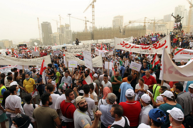 Đụng độ giữa lực lượng cảnh sát và người biểu tình tại Liban ảnh 1