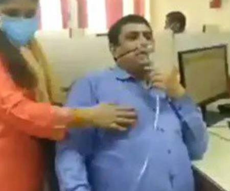 Ấn Độ: Bệnh nhân nhiễm COVID-19 đi làm khi vẫn đeo bình oxy ảnh 1