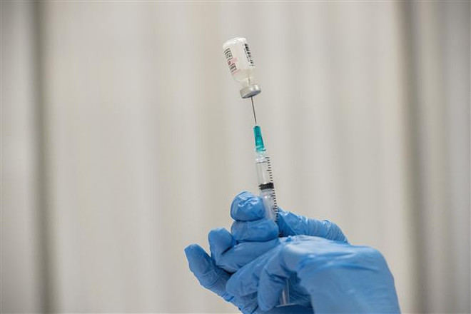 Vaccine COVID-19: "Liều thuốc" hồi sinh nền kinh tế toàn cầu ảnh 1