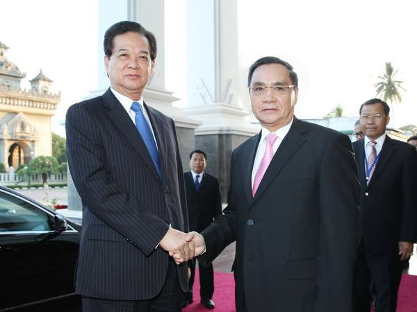 Việt Nam-Lào nhất trí tiếp tục phối hợp triển khai dự án chiến lược ảnh 1