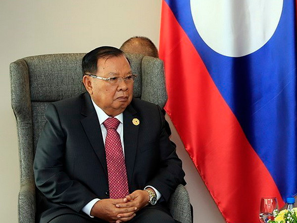 Tổng Bí thư Lào tiếp đoàn đại biểu cấp cao Đảng Cộng sản Việt Nam ảnh 1