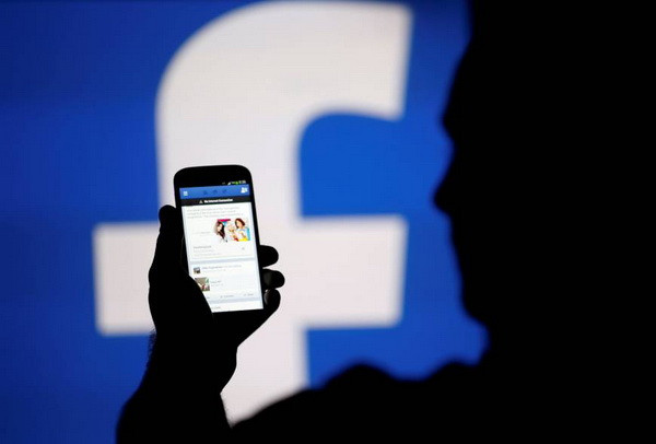 Ảnh chỉ có tính minh họa. (Nguồn: Reuters) Facebook thông báo nới lỏng lệnh cấm quảng cáo tiền điện tử ảnh 1