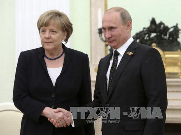Giải quyết khủng hoảng Ukraine, khôi phục quan hệ Nga-Đức ảnh 1