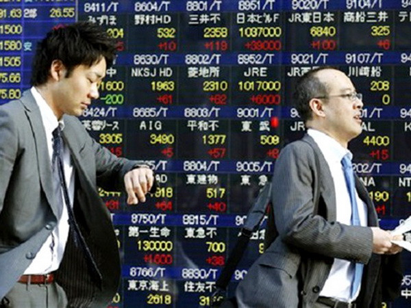 Chứng khoán biến động trái chiều trước số liệu kinh tế Trung Quốc ảnh 1