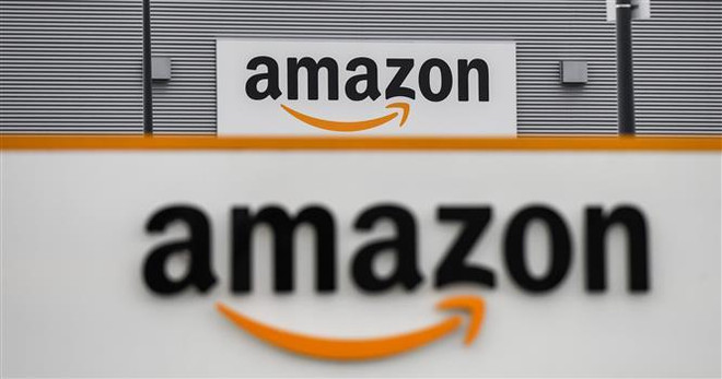 Biểu tượng Amazon. (Ảnh: AFP/TTXVN) Nhân viên Amazon tại Đức đình công đúng dịp khuyến mãi lớn toàn cầu ảnh 1