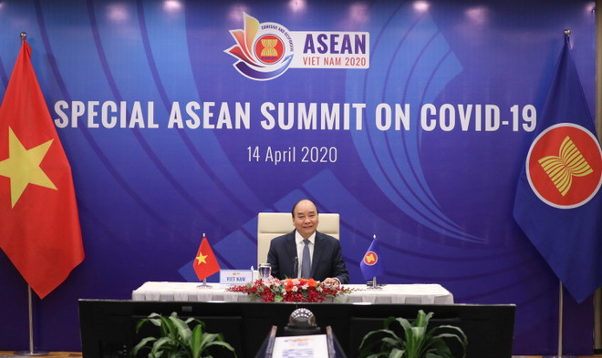 Thủ tướng Nguyễn Xuân Phúc, Chủ tịch ASEAN 2020, phát biểu khai mạc. (Ảnh: Thống Nhất/TTXVN) ASEAN 2020: Thúc đẩy hợp tác ASEAN trong phòng, chống dịch COVID-19 ảnh 1