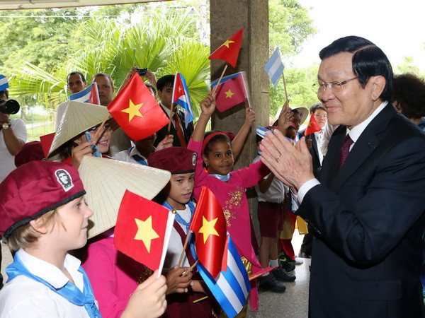 Chủ tịch nước Trương Tấn Sang dự diễn đàn doanh nghiệp Việt Nam-Cuba ảnh 1