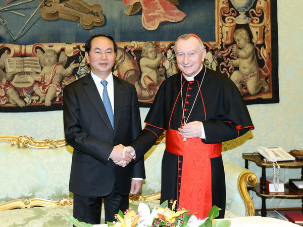 Chủ tịch nước Trần Đại Quang hội kiến Thủ tướng Vatican Parolin. (Ảnh: Nhan Sáng/TTXVN) Chủ tịch nước hội kiến Giáo hoàng Francis, gặp Thủ tướng Vatican ảnh 1