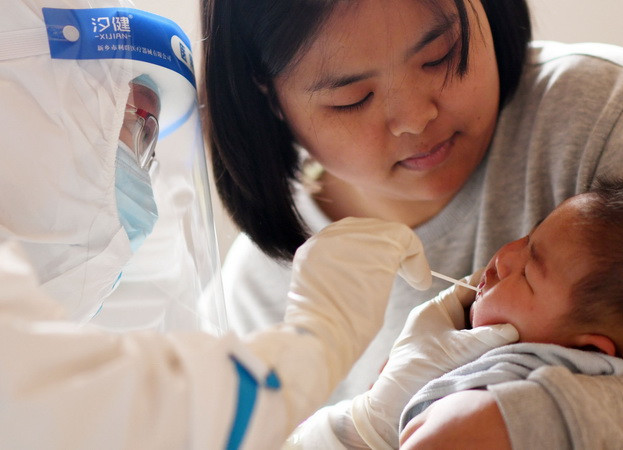 Trung Quốc ghi nhận số ca mắc COVID-19 hàng ngày cao kỷ lục ảnh 1