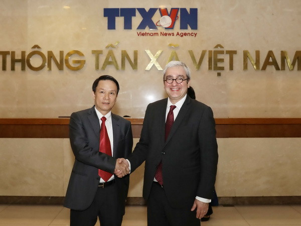 Tổng Giám đốc TTXVN tiếp Chủ tịch, Giám đốc điều hành hãng AFP ảnh 1