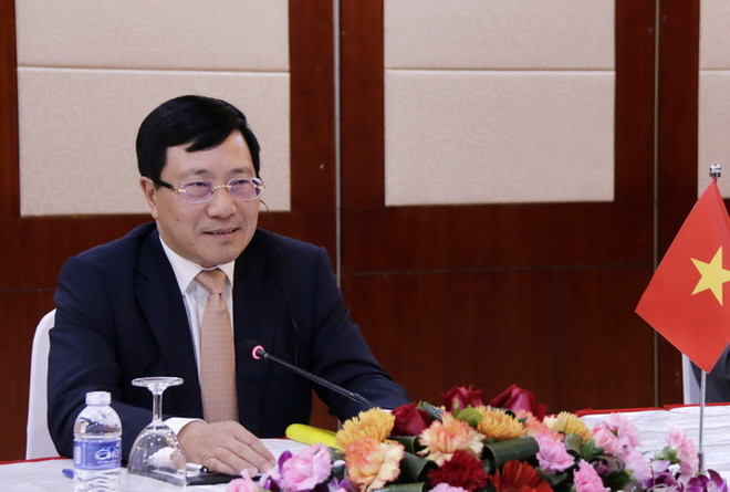 Phó Thủ tướng, Bộ trưởng Phạm Bình Minh. (Ảnh: Phạm Kiên/TTXVN) Cuộc họp đặc biệt của Hội đồng điều phối ASEAN về dịch COVID-19 ảnh 1