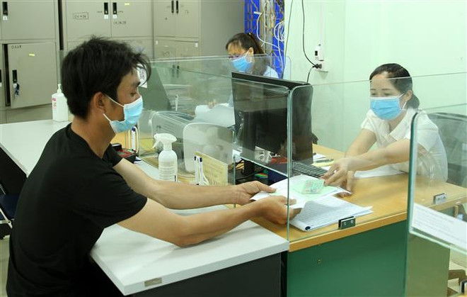 Nghị quyết về chính sách hỗ trợ người lao động gặp khó khăn do dịch ảnh 1