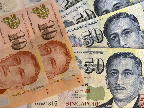 Singapore bác tin dùng quỹ dự trữ ngoại tệ để giữ giá đồng nội tệ ảnh 1