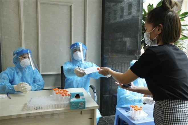 Long An: Giám sát lấy mẫu xét nghiệm SARS-CoV-2 tại cộng đồng ảnh 1