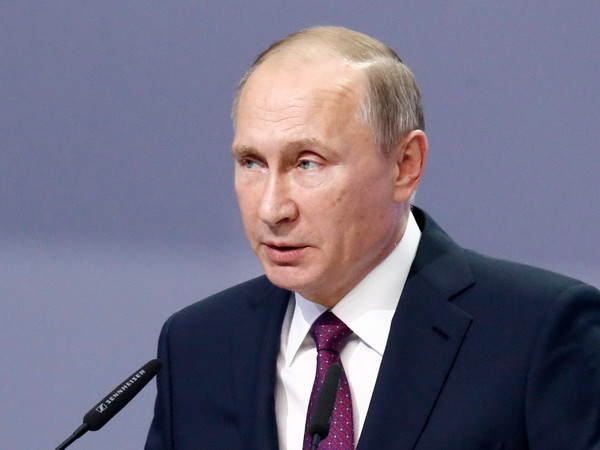Tổng thống Nga Vladimir Putin tại một hội nghị quốc tế ở Moskva, Nga. (Nguồn: EPA/TTXVN) Tổng thống Putin khẳng định quân đội Nga không đe dọa bất cứ ai ảnh 1