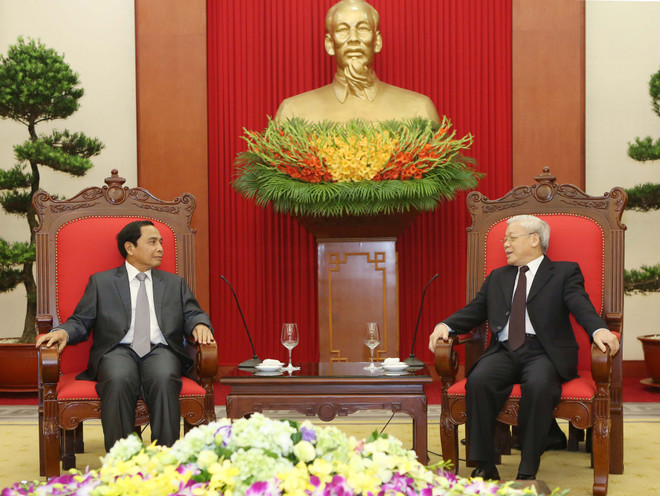 Tổng Bí thư tiếp đoàn Ban Kiểm tra Đảng Nhân dân Cách mạng Lào ảnh 1