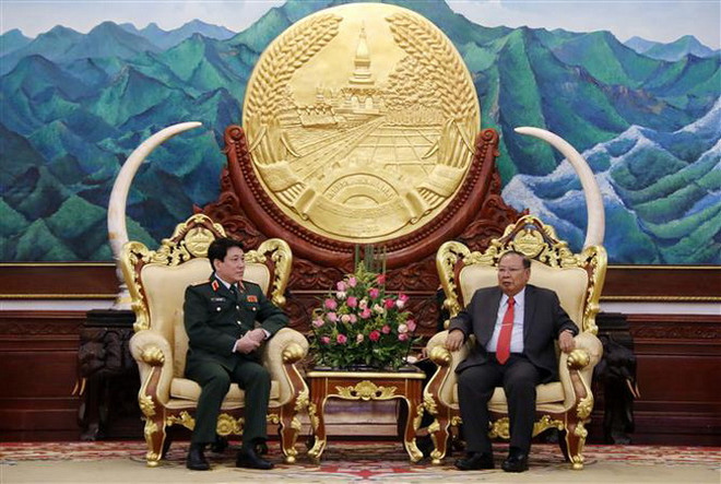 Tổng Bí thư Lào: Tạo điều kiện để phát triển quan hệ Quân đội Lào-Việt ảnh 1