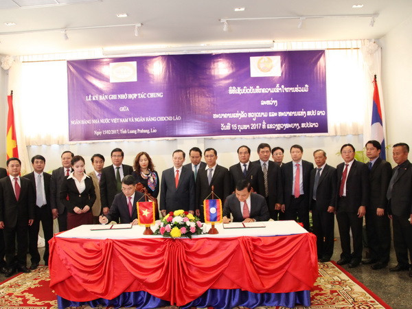 Ký Biên bản ghi nhớ hợp tác giữa 2 ngân hàng trung ương Việt-Lào ảnh 1