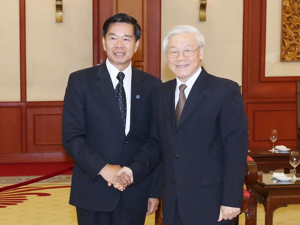 Tổng Bí thư Nguyễn Phú Trọng tiếp Đô trưởng thủ đô Vientiane ảnh 1