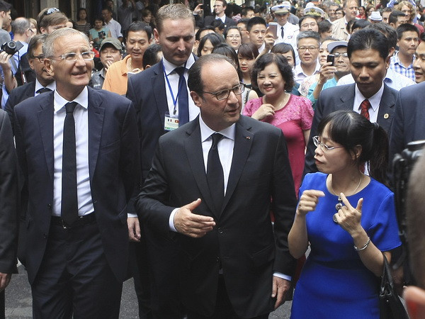Báo chí Pháp đưa tin đậm nét về chuyến thăm Việt Nam của ông Hollande ảnh 1