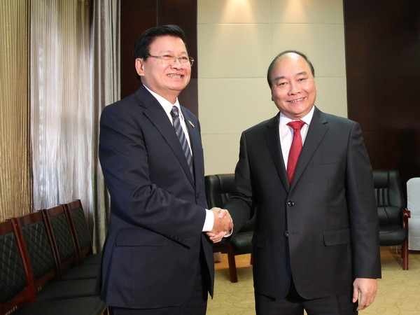 Thủ tướng Nguyễn Xuân Phúc gặp Thủ tướng Lào Sisoulith ảnh 1