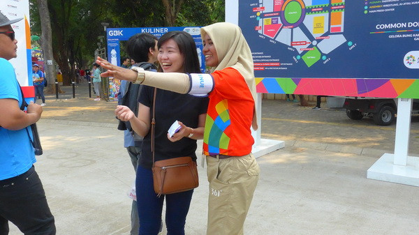 ASIAD 2018: Đội quân áo đỏ cam, những nụ cười và nhiệt huyết ảnh 1