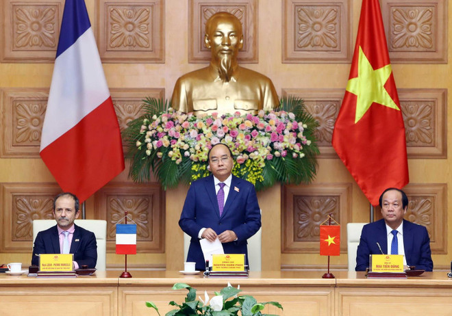 Thủ tướng Nguyễn Xuân Phúc phát biểu tại lễ ký. (Ảnh: Thống Nhất/TTXVN) Lễ ký kết văn bản ghi nhớ hợp tác về xây dựng Chính phủ điện tử ảnh 2