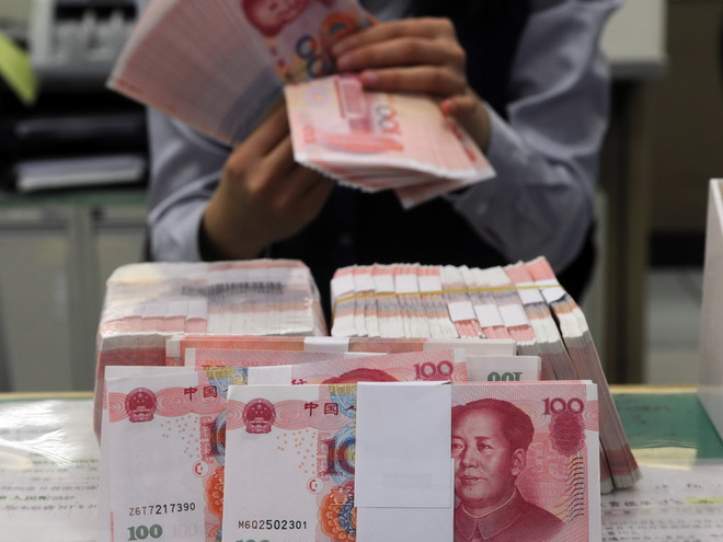 Mỹ muốn Trung Quốc điều chỉnh chính sách tiền tệ và sở hữu trí tuệ ảnh 1