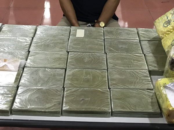 Truy tố hai bị can trong vụ giấu 40 bánh heroin trong nắp capô xe ôtô ảnh 1