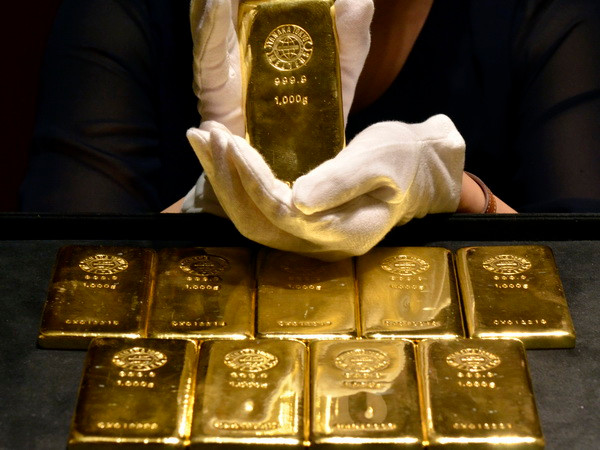 Giá vàng thế giới chạm mức đỉnh của hai tuần khi đồng USD suy yếu ảnh 1