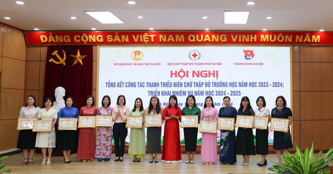 ttxvn_cuu tro nhan dao truong hoc Ha Noi.jpg
