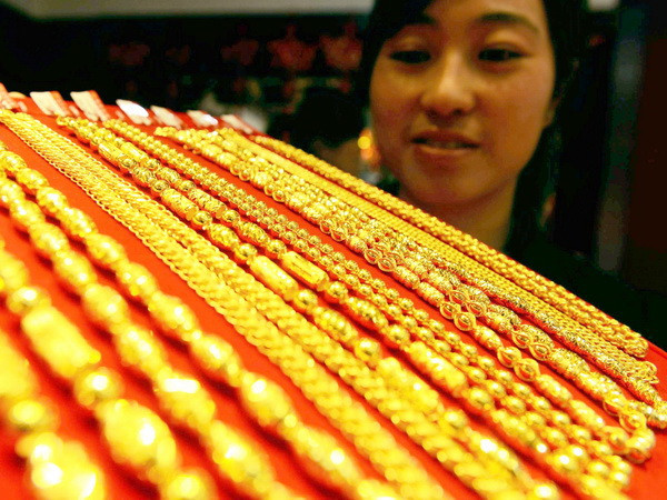 Giá vàng tại thị trường châu Á ít biến động trong phiên đầu tuần ảnh 1