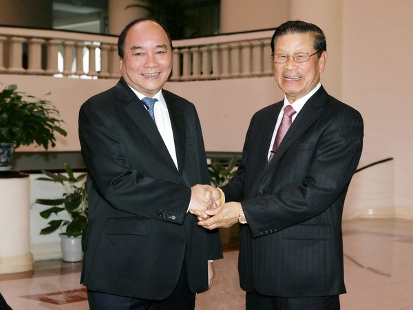 Lào sẽ tiếp tục cùng Việt Nam vun đắp tình hữu nghị vĩ đại ảnh 1