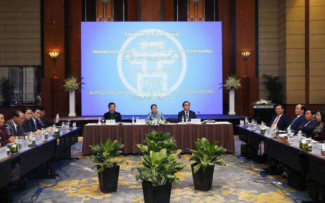 Việt Nam-Lào trao đổi kinh nghiệm hoạt động chính quyền địa phương ảnh 1