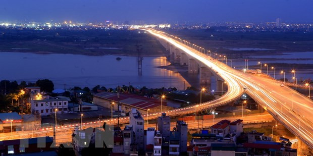 Cầu Vĩnh Tuy bắc qua sông Hồng. (Ảnh: Huy Hùng/TTXVN) Phê duyệt chủ trương đầu tư Dự án cầu Vĩnh Tuy giai đoạn 2 ảnh 1