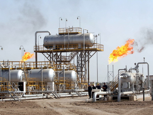 IEA hạ dự báo mức tiêu thụ dầu mỏ thế giới năm 2014 ảnh 1