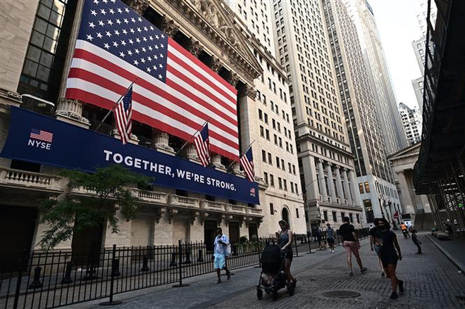 Các chỉ số chứng khoán Phố Wall chạm mức cao kỷ lục mới ảnh 1