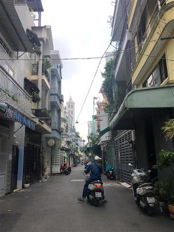 Hẻm 205 đường Trần Văn Đang, phường 11, Quận 3 thông thoáng sau khi mở rộng. (Ảnh: Thanh Vũ/TTXVN) Lan tỏa phong trào hiến đất mở rộng hẻm tại Thành phố Hồ Chí Minh ảnh 2